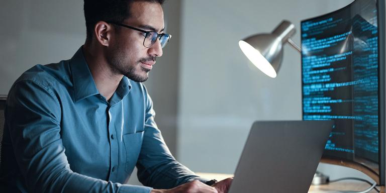 Computer Technician working on laptop